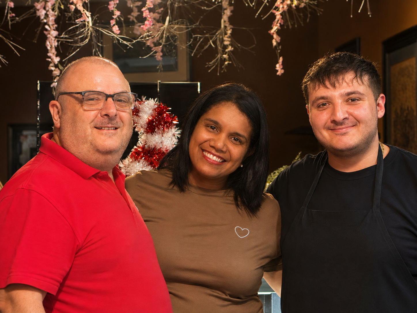 The That's Amore family behind the counter